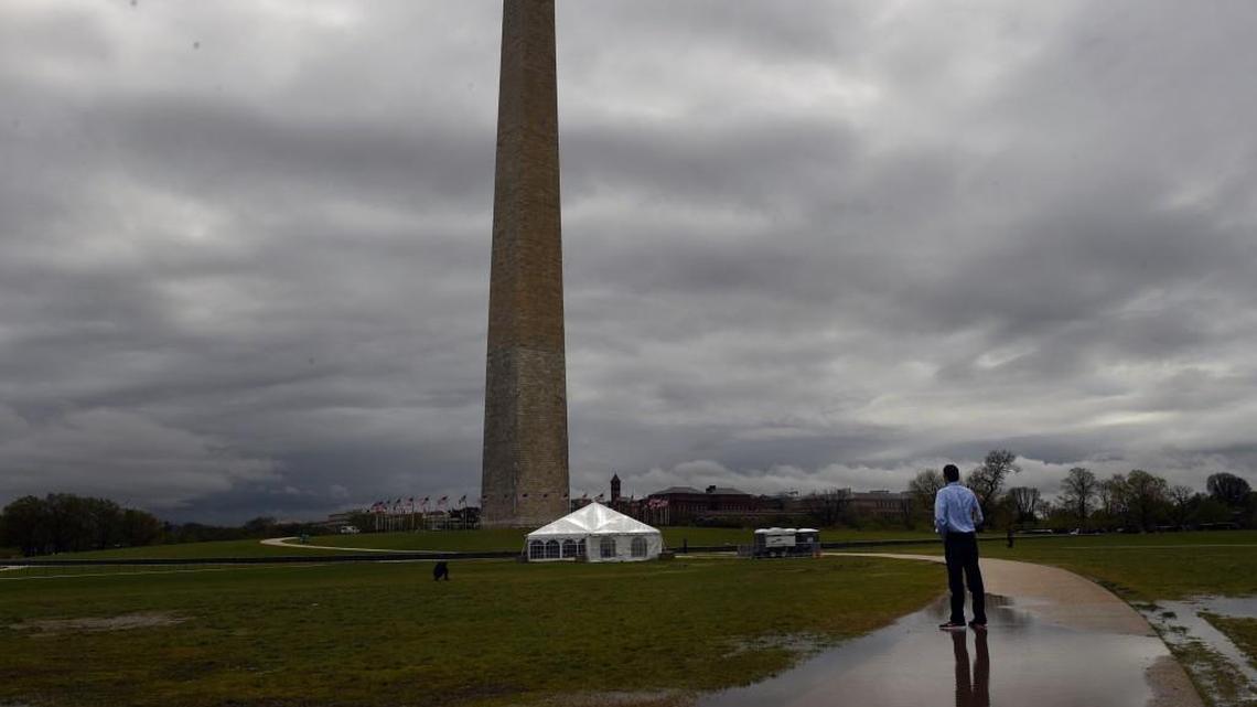 In the shadow of the Washington Monument, a Christian group attempts nonstop prayer