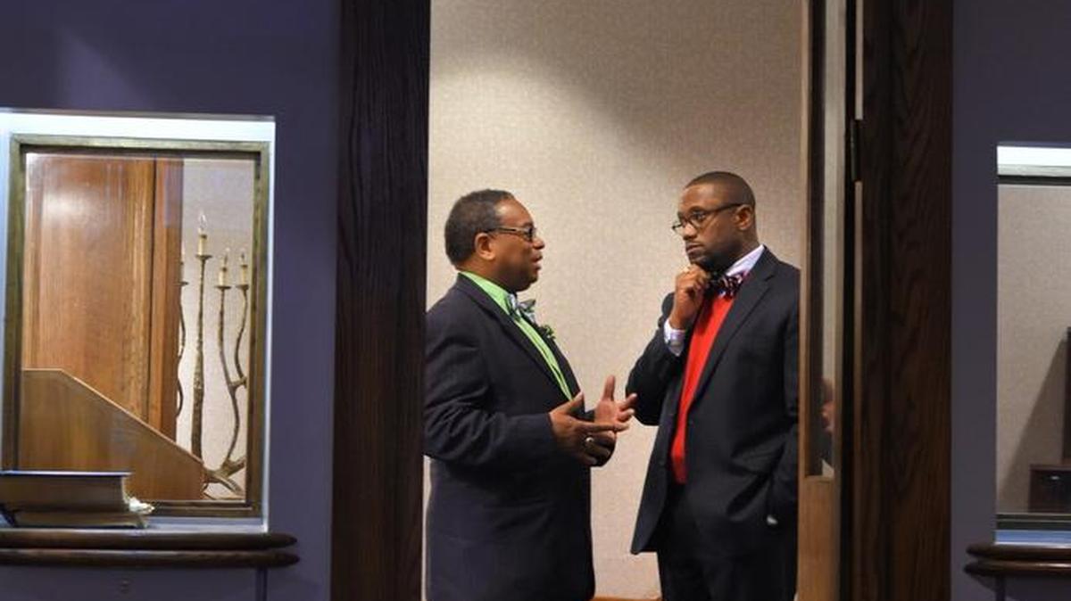 Rev. Dr. Cleveland Mason, a pastor at Perkins Square Baptist Church, left, and Rev. Domanic Smith, Pastoral Outreach coordinator at Sinai Hospital, talk in the Sinai Hospital of Baltimore chapel.