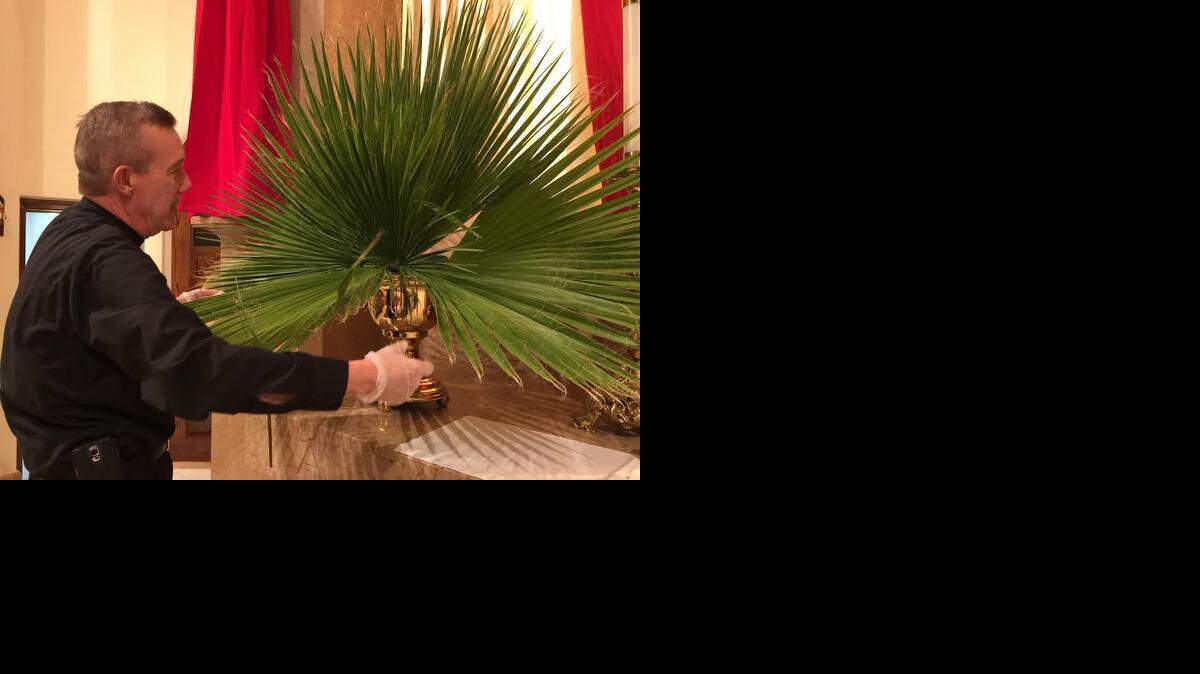 
Monsignor Richard Harris has prepared altar palms for his congregations each year since he has been ordained a priest.
