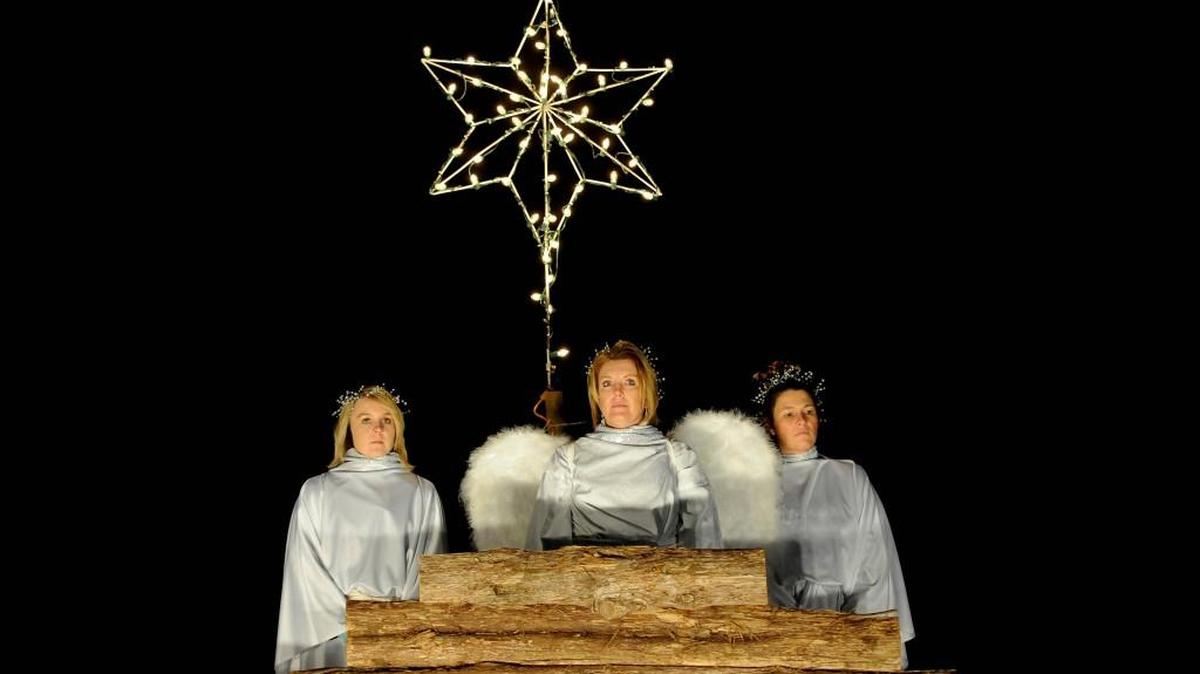 Angels look down on the manger as the story of the birth of Jesus is told during a live nativity scene put on by Oakdale Baptist Church. This year the event will be Thursday-Saturday.