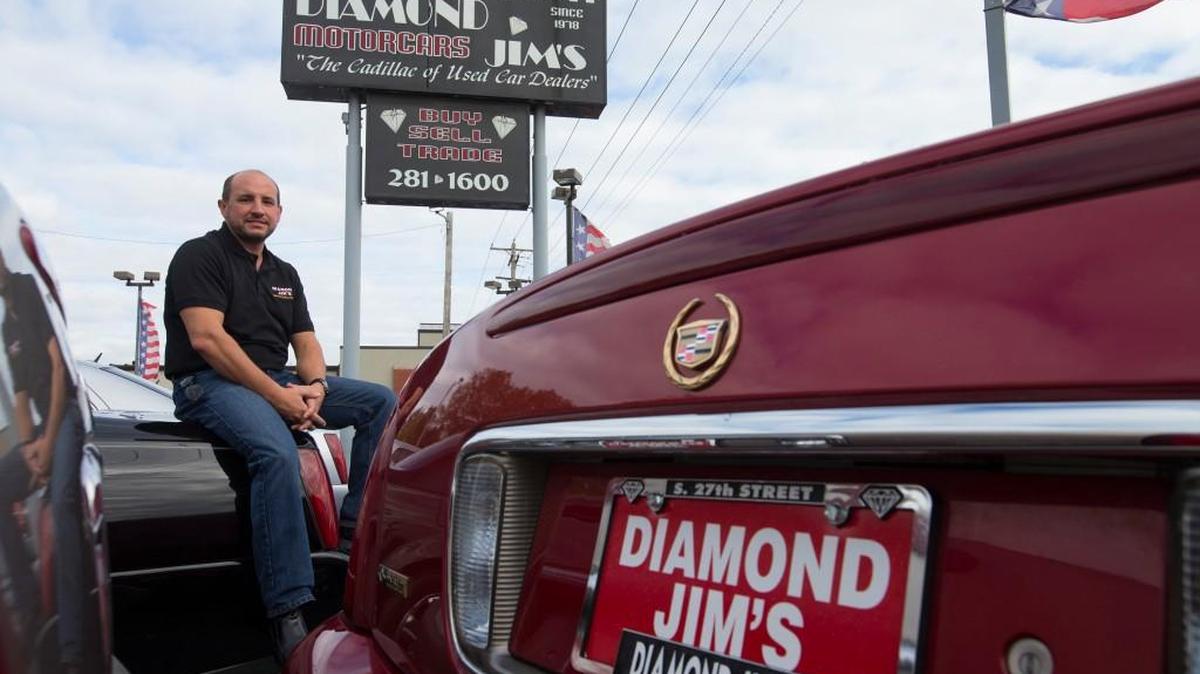 Owner Tom Letizia at Diamond Jim’s Auto Sales in Greenfield, Wis., says shoppers are now looking at cars a step above of what they were previously interested as consumer lending has eased.