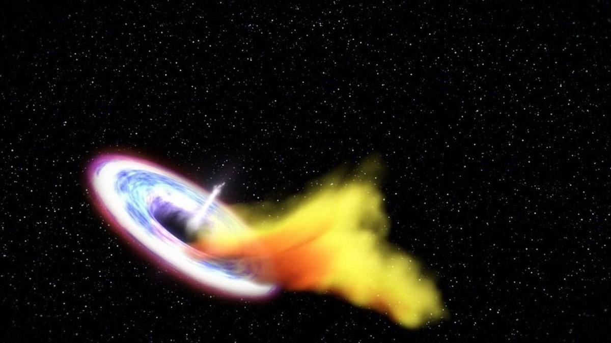 Illustration shows a star torn up by a black hole’s strong gravity. The black hole is launching a powerful jet of matter into space.