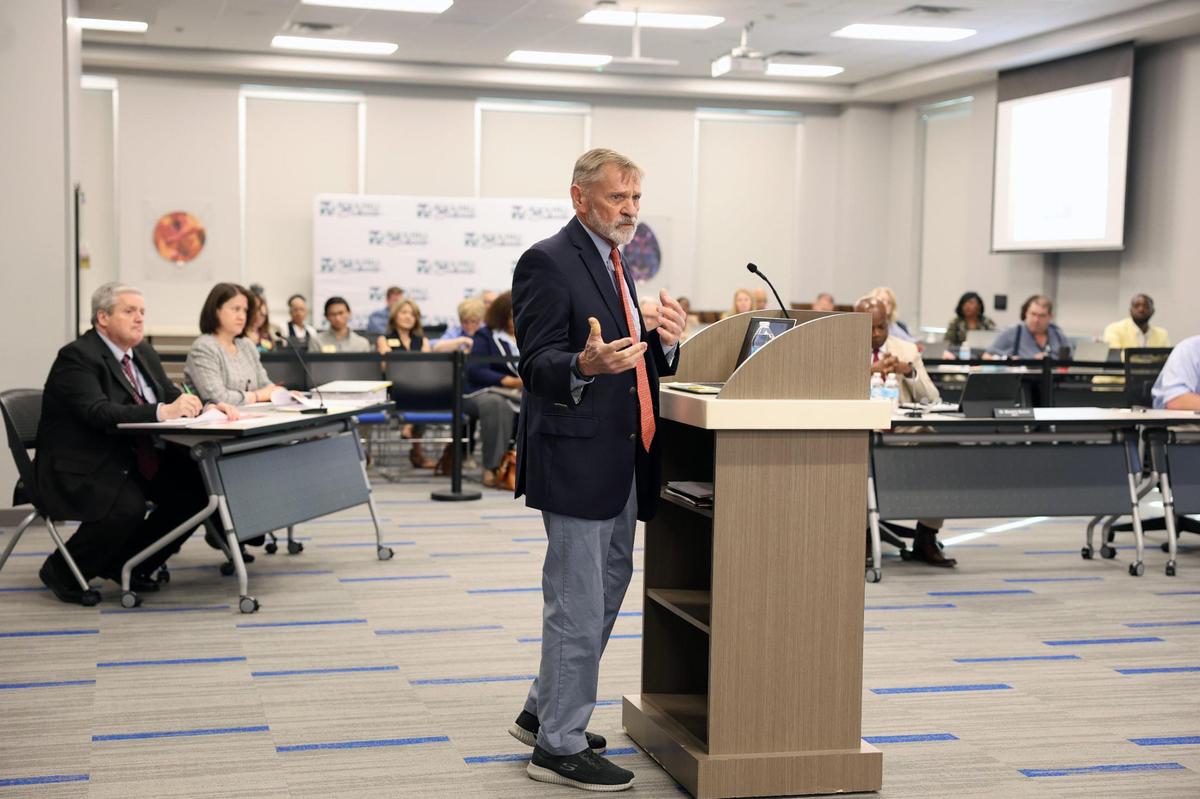 Harry Miley, a former chief financial officer in Richland School District 2 , talks to the Rock Hill School Board Wednesday about the district’s $15.8 million shortfall.