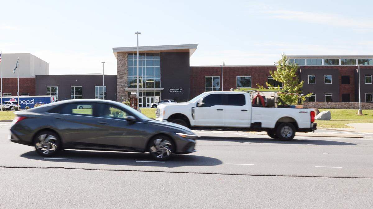 A crossing guard outside Catawba Ridge High School in Fort Mill was injured after being struck by a vehicle last fall. The district won’t have guards to direct vehicle traffic when school starts Monday.