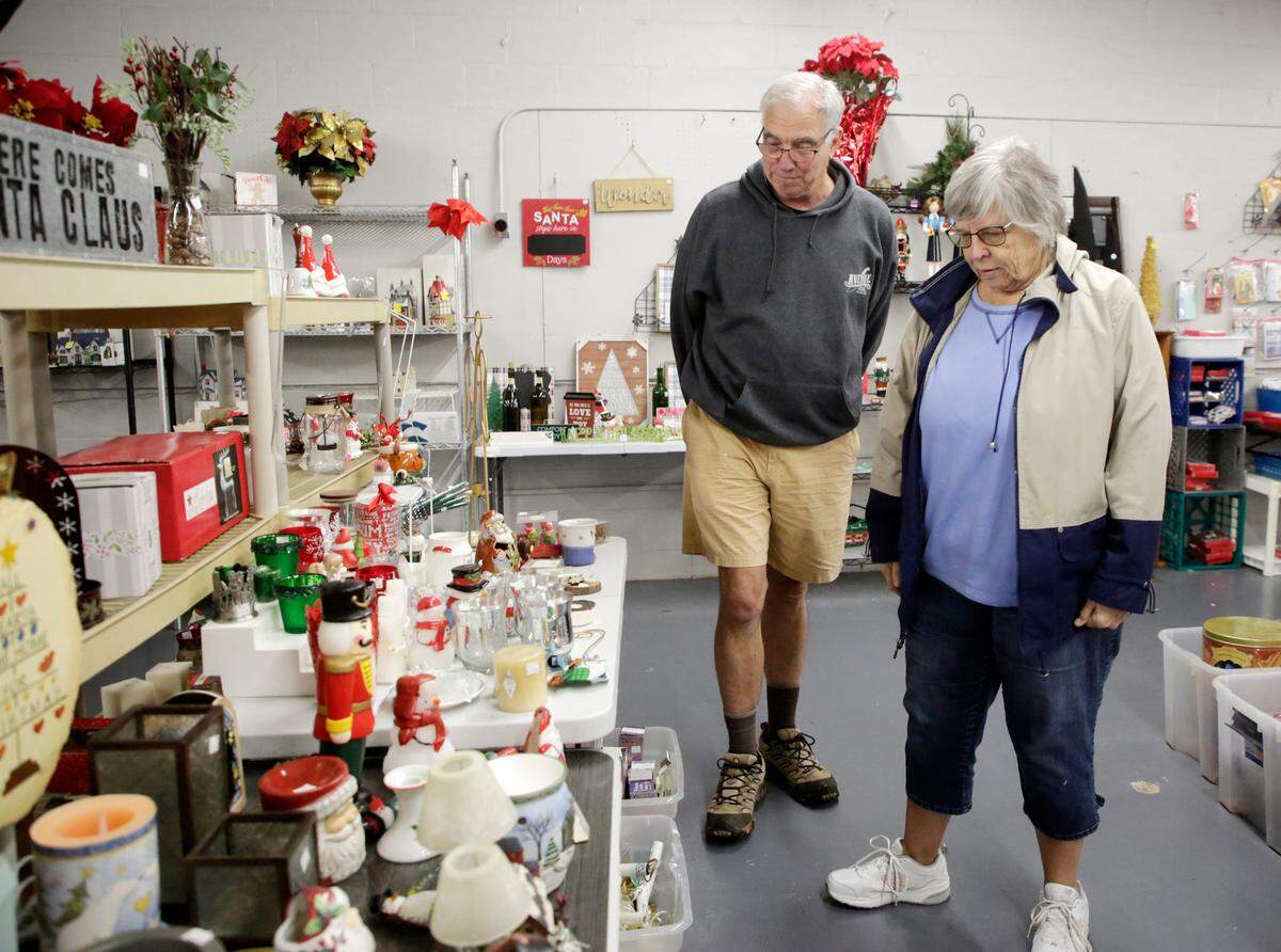 Don Williamson and Kathy Williamson browse at the Humane Society of York County’s Christmas Thrift Store in Fort Mill.