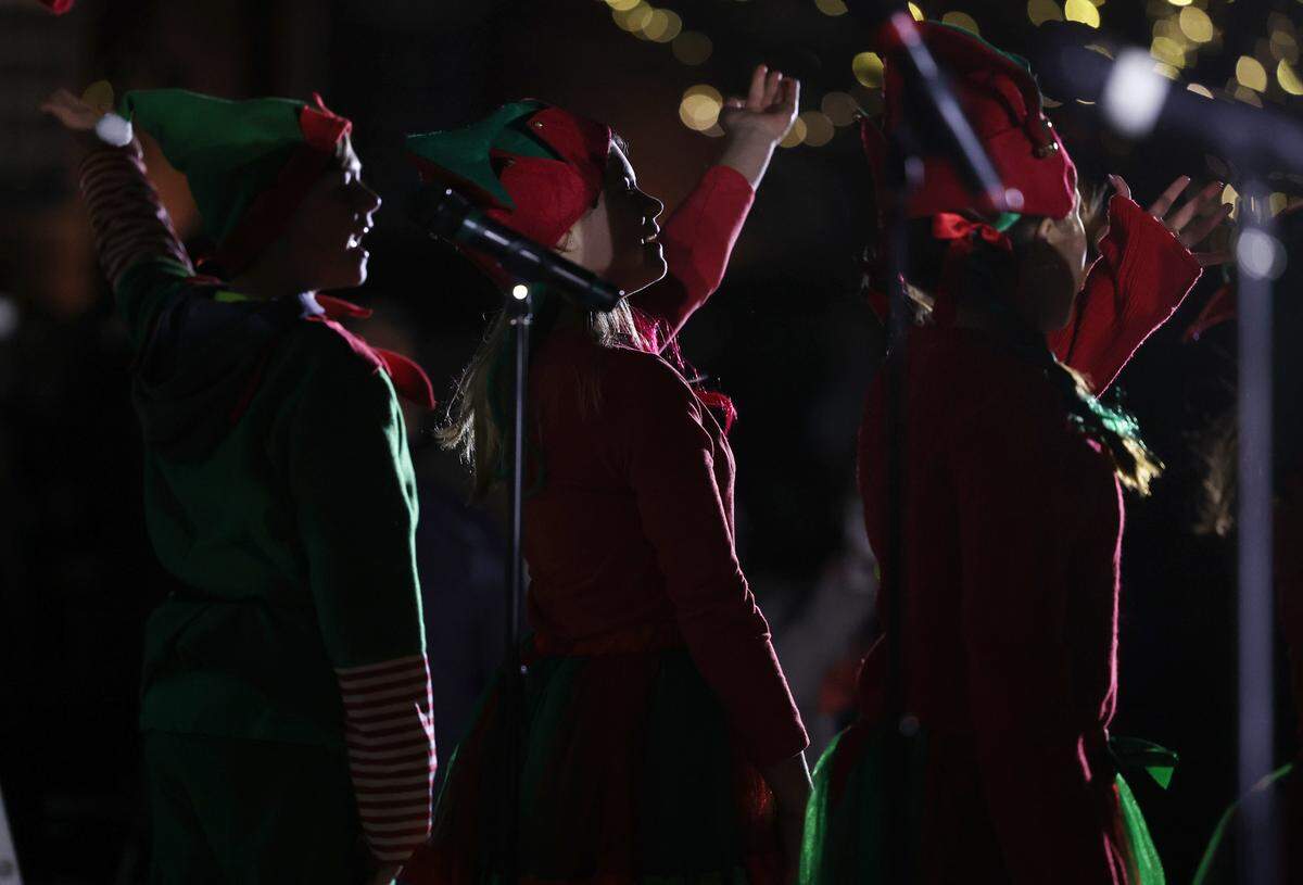 Children perform during the ChristmasVille opening ceremony Thursday in downtown Rock Hill.