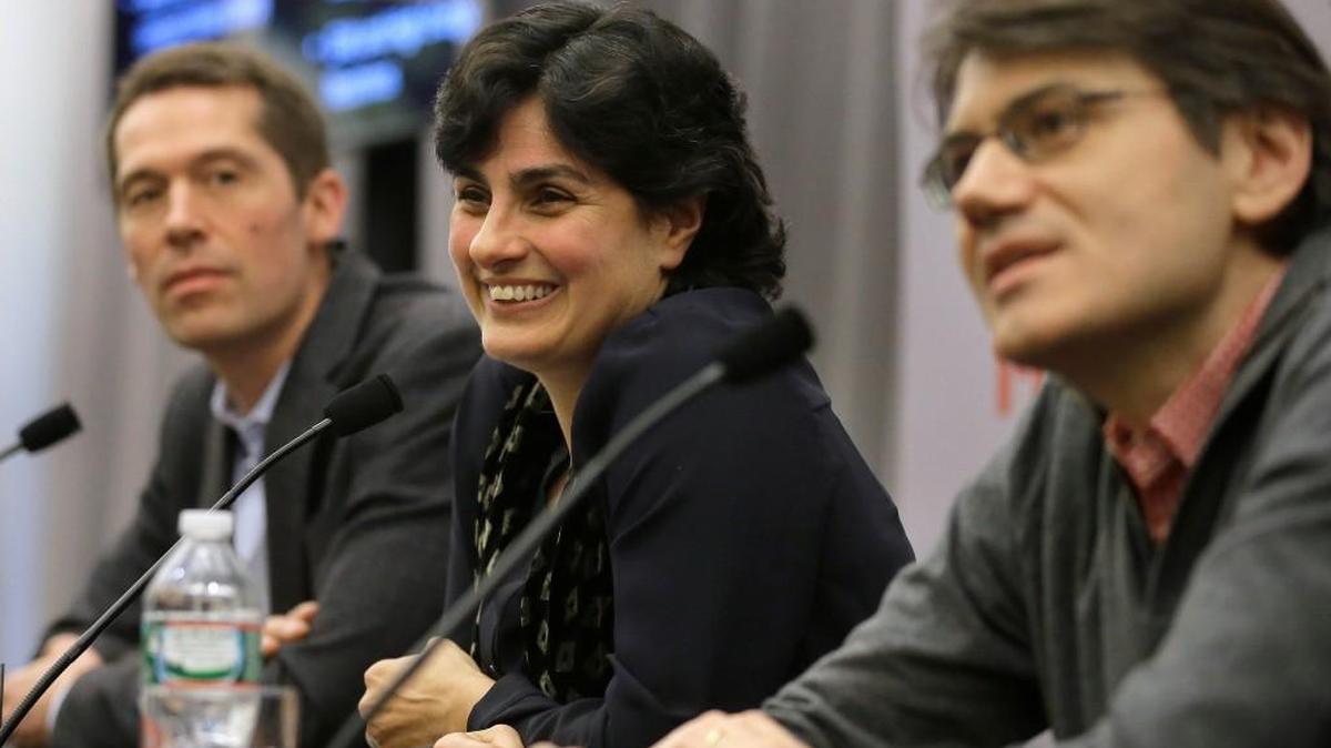 Massachusetts Institute of Technology astrophysics professor Nergis Mavalvala, center, takes questions from members of the media with MIT physics professor Matthew Evans, left, and research scientist Erik Katsavounidis during a presentation on the discovery Thursday of gravitational waves.