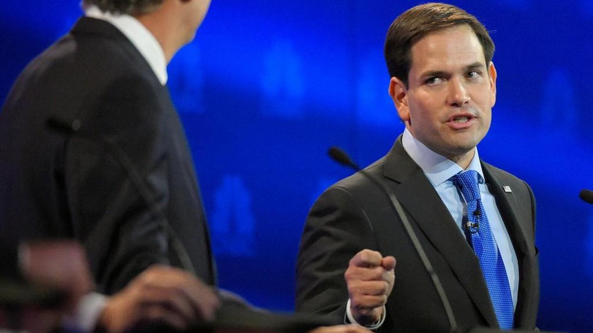 Marco Rubio, right, and Jeb Bush, argue a point during the CNBC Republican presidential debate at the University of Colorado on Wednesday.