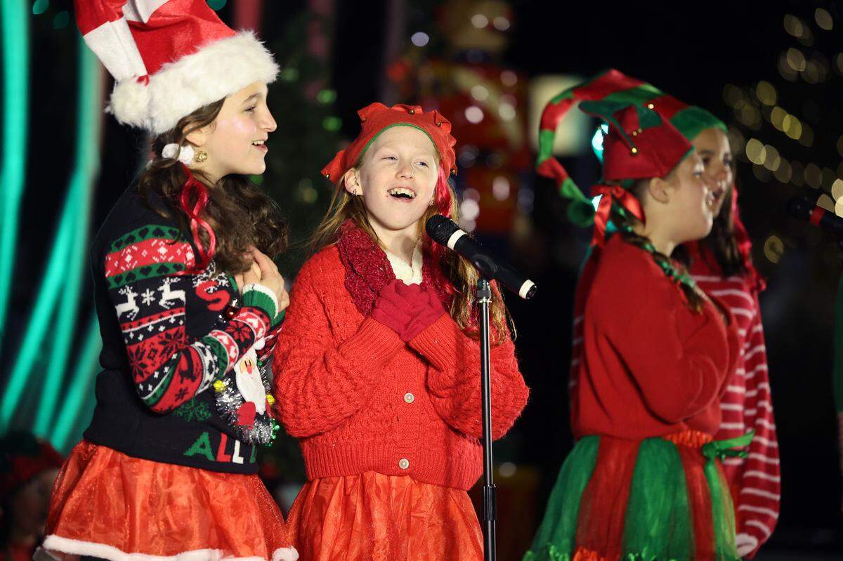 Children perform during the ChristmasVille opening ceremony Thursday in downtown Rock Hill.