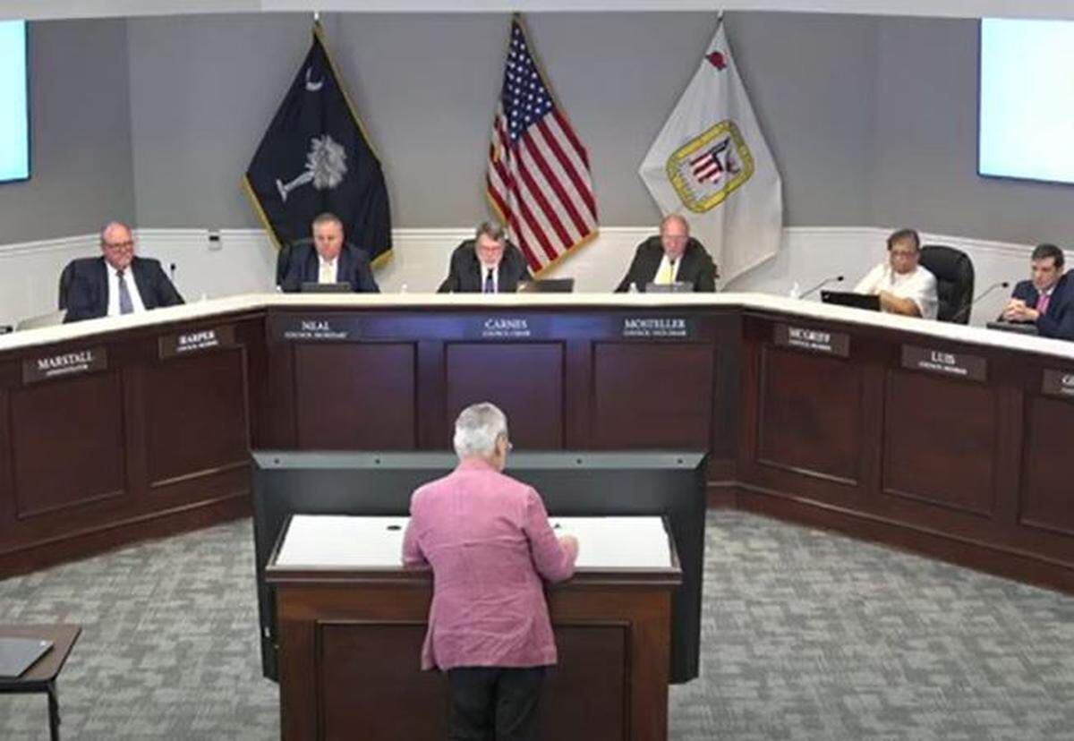 Lancaster County Council listens as Lennar Charlotte Division President Jon Hardy speaks Monday night about a new proposed subdivision, The Haven at North Corner.