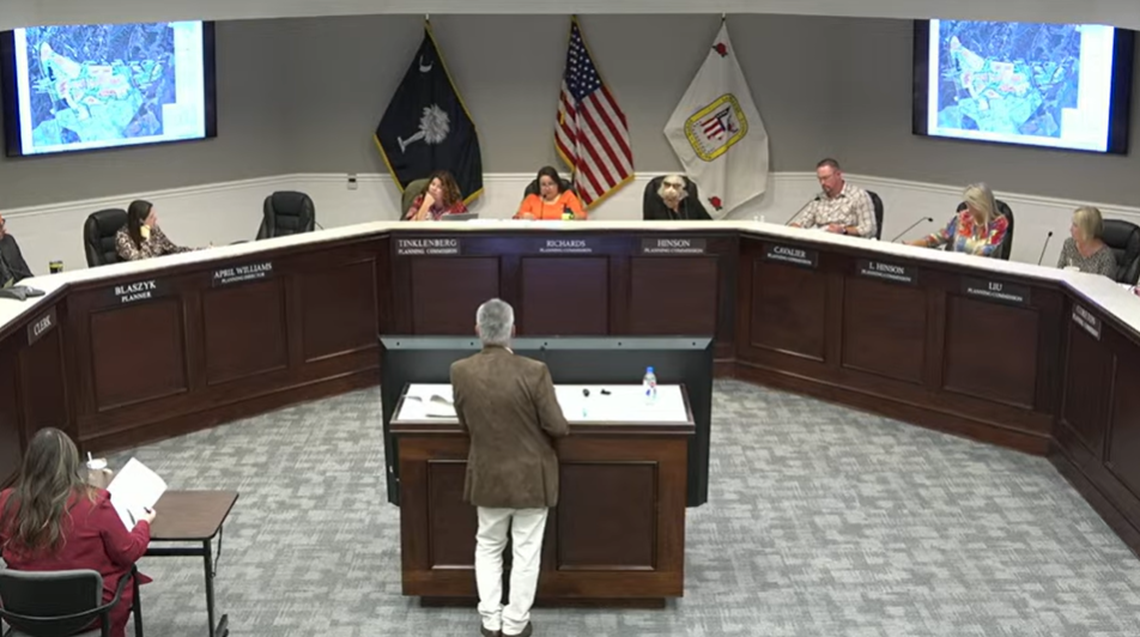 The Lancaster County Planning Commission listens to plans Tuesday for a new subdivision near Lancaster that would add more than 900 homes.