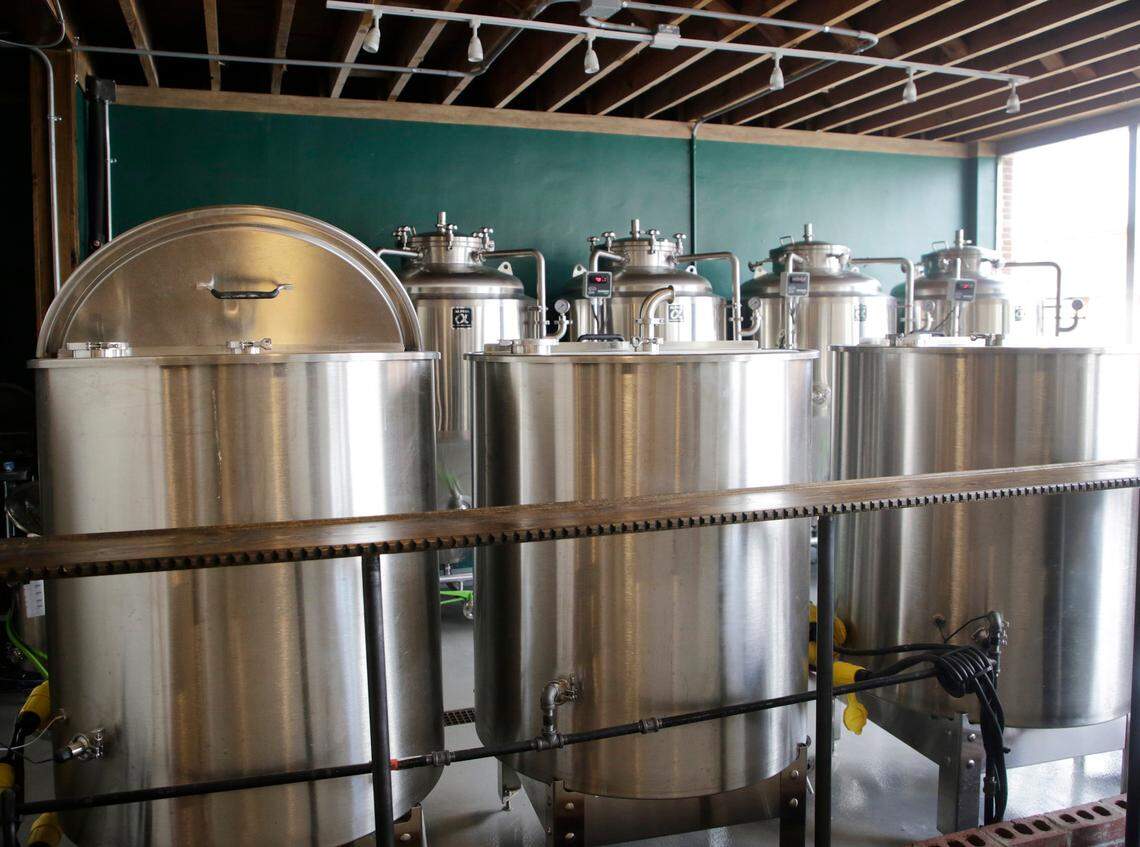 The inner workings of Working Theory Beer Co. are seen from a window fronting East Liberty Street in downtown York.