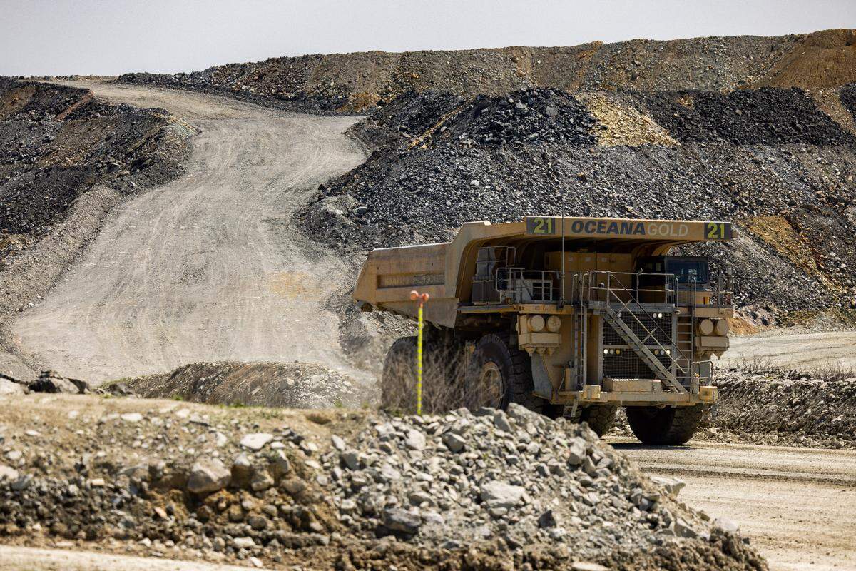 A Komatsu 730E haul truck, the largest on site, travels along the haul road carrying approximately at Haile Gold Mine in Lancaster County carrying 200 tons of material.