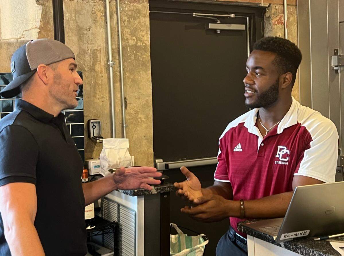 General manager Paul Peart (right) speaks with bartender Tim Lecolst at The Power House.