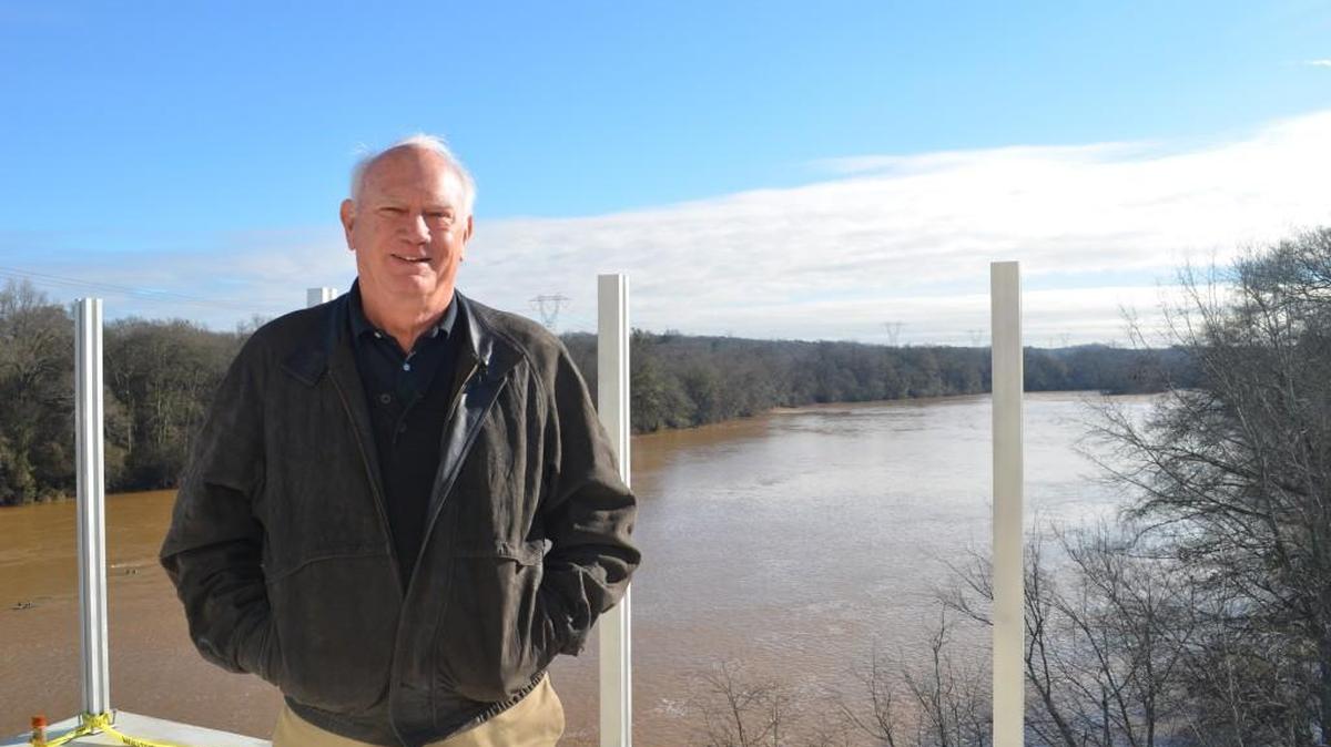 Colby Mosier, one of the partners in the Pump House Restaurant, on the one of the fifth-floor patios that overlooks the Catawba River.
