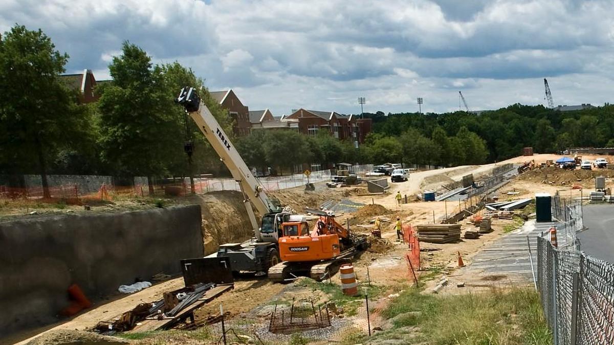
The Charlotte Area Transit System is adding three projects to the light-rail extension, which is scheduled to open in 2017. In this photo, construction takes place on the UNC Charlotte campus.
