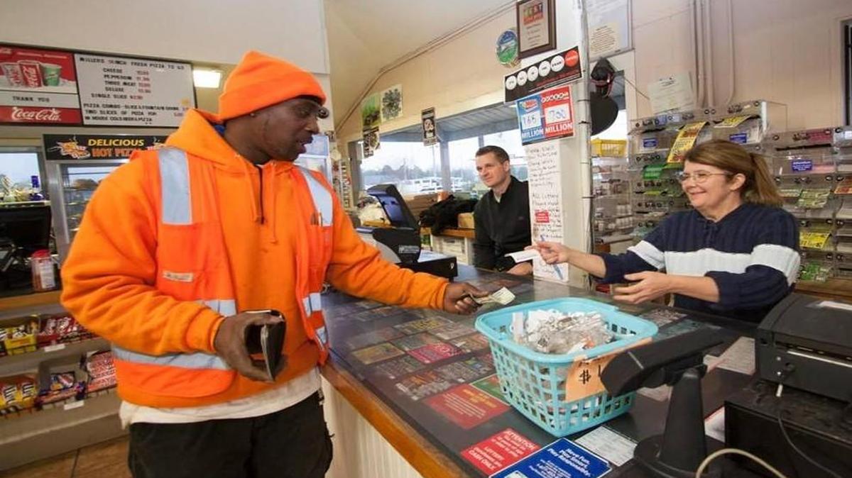 Randy Blount buys a Powerball ticket. He was one of many who bought a ticket last month at Miller Produce in Fort Mill.