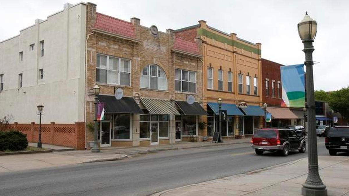 
This 2015 file photo shows The Bass and McFadden properties on East Main Street in downtown Rock Hill, then occupied by the Overhead Station, left, and Thi’s Place On Main.