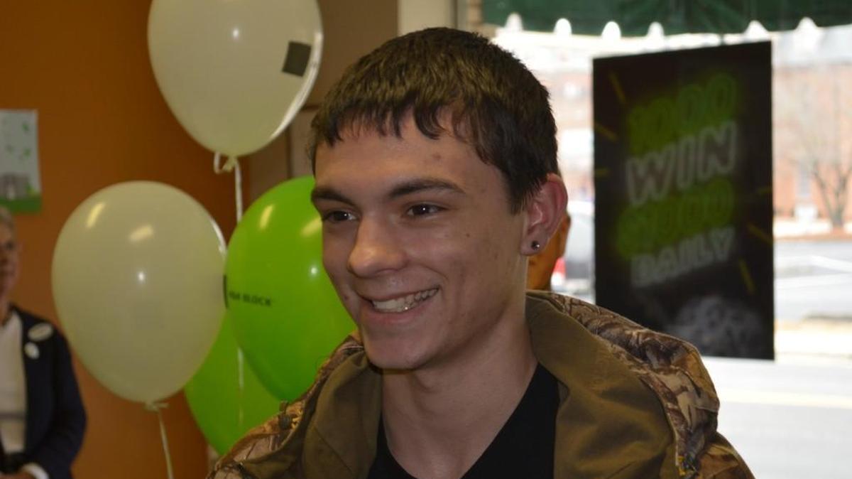 William Helmetag smiles after receiving a $1,000 prize in the H&R Block contest. He is the first winner in the Rock Hill area.