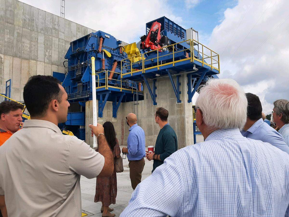 Palmetto Recycling project manager Mark Saleh, left, leads tours of a new auto shredder in Rock Hill.