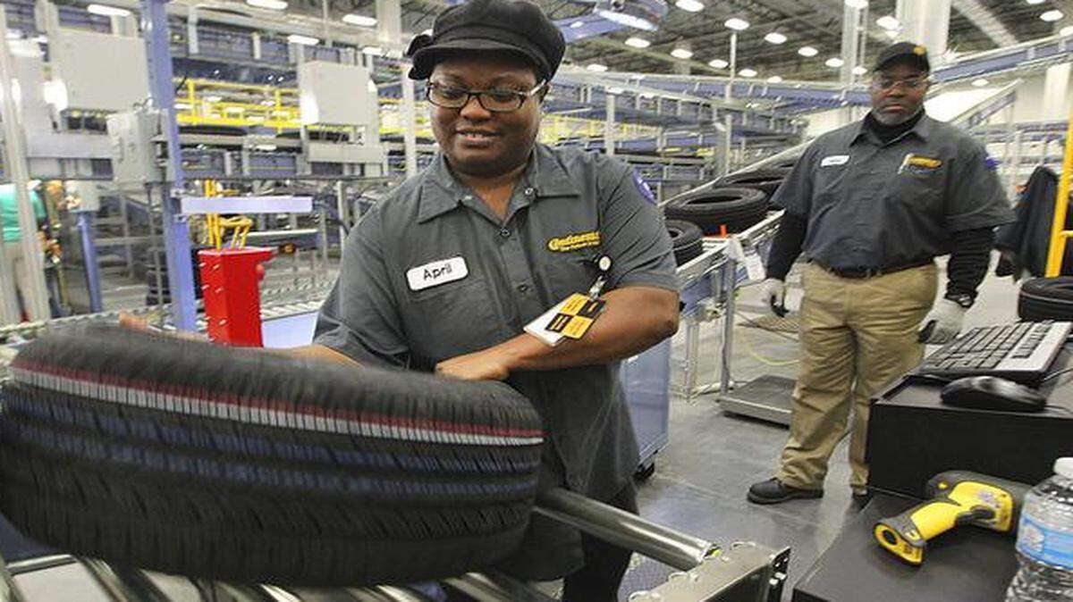 
A worker at the Continental plant in Sumter grades the quality of any irregular tires and discards those not up to standards.
