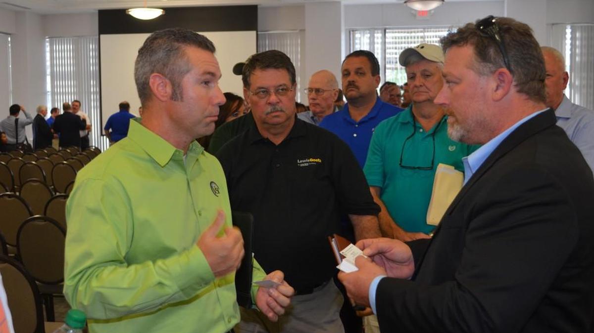 
Jonathan Taylor, left, of Vendable Systems of Rock Hill, talks with Zachary Cosby, project manager for Shimizu North America, builder of the Giti tire plant in Richburg. 

