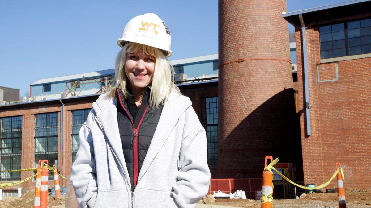 Tara Sherbert, CEO of The Sherbert Group and developer of the The Power House in Knowledge Park stands in front of the new project Wednesday in Rock Hill.