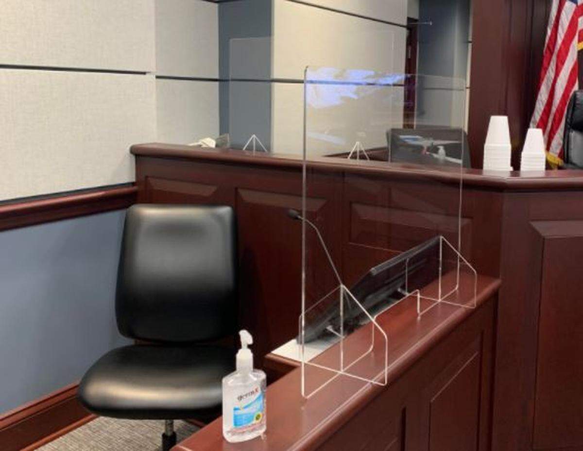 The witness stand in a courtroom at the Moss Justice Center in York County now has a plastic shield because of the COVID-19 pandemic to maintain social distancing.