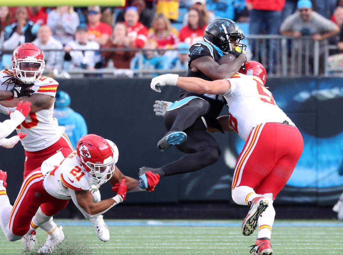 Panthers Xavier Legette is tackled by Chiefs George Karlaftis at Bank of America Stadium in Charlotte, N.C.