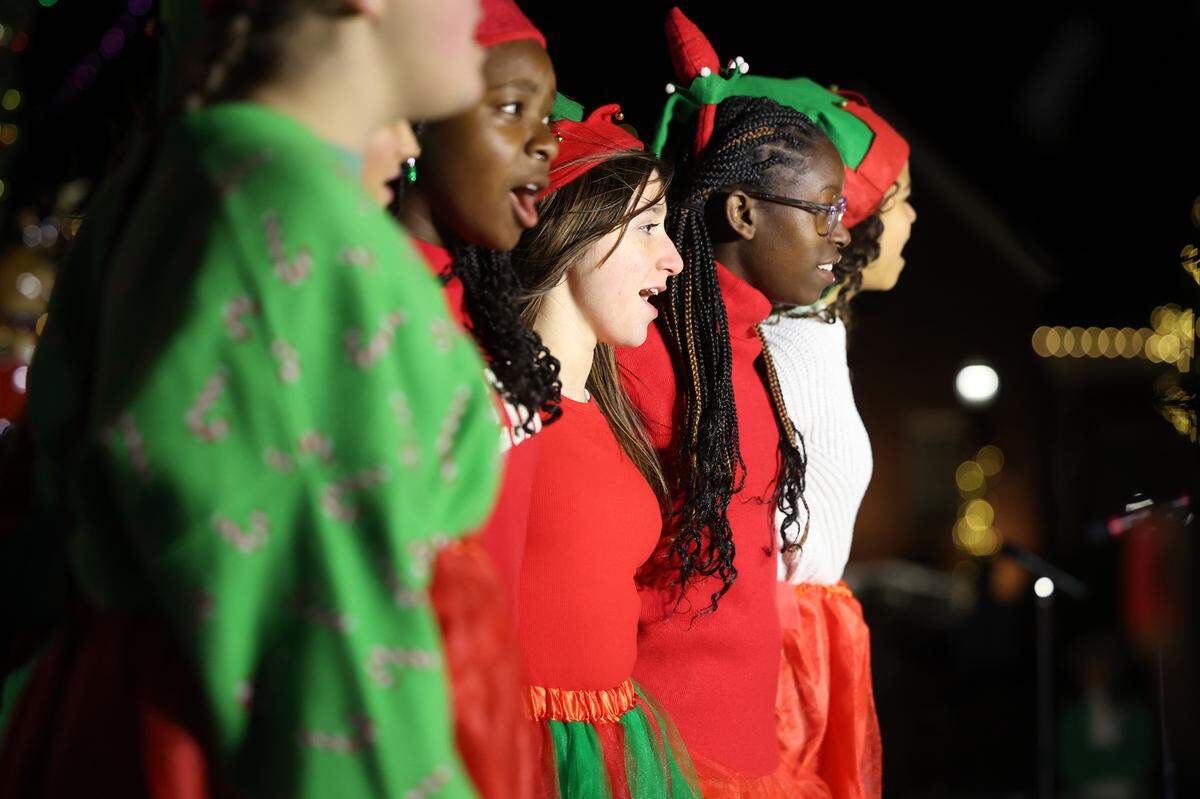Children perform during the ChristmasVille opening ceremony Thursday in downtown Rock Hill.