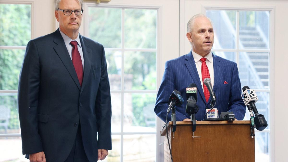 Randy Hood, right, and Chad McGowan, attorneys at McGowan, Hood, Felder & Phillips talk about a lawsuit involving Erickson Lee, a man convicted of sex crimes. A judge sentenced Lee to nine years prison on Sept. 6.