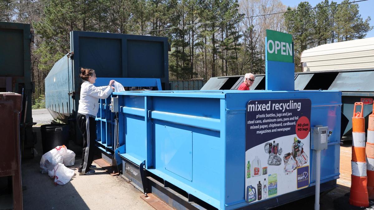 Susan Baker unloads her recyclables Tuesday at the Allison Creek Collection and Recycling Center in Lake Wylie.