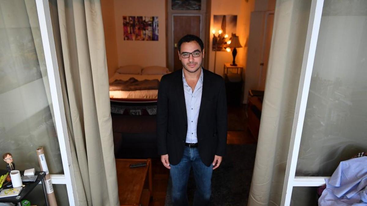 Amr Arafa at his apartment in Washington, D.C. He has started a website called EmergencyBnB where people can put up their homes, or a room in their homes, so that refuges or victims of domestic violence can stay there in times of need for free.