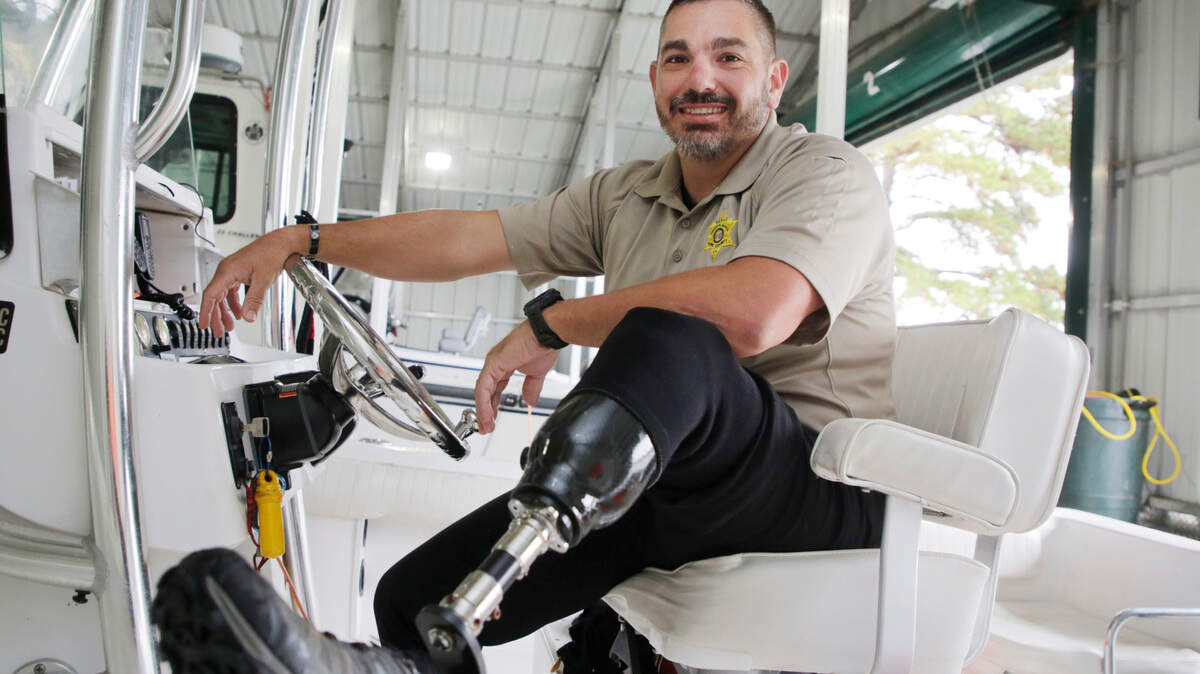 Lt. Nathan Clark had his left leg amputated below the knee after he was hurt chasing a suspect in 2020, but is returned to work with a prosthesis.