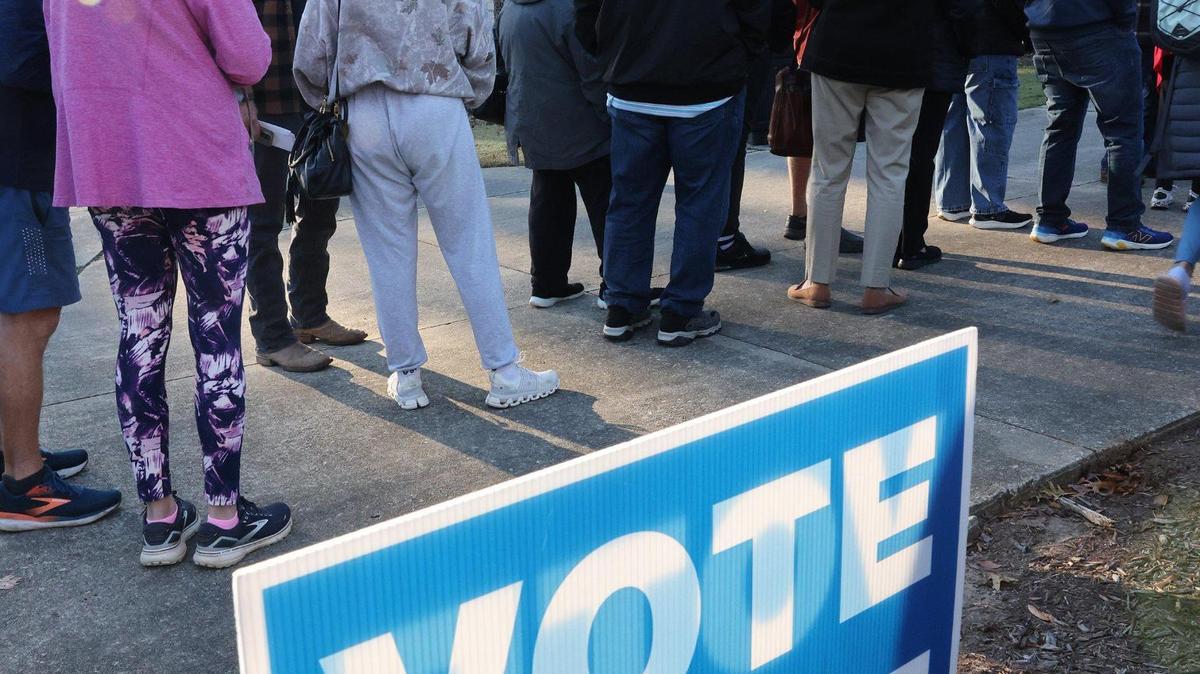 Voters wanting to cast their vote early line up at Baxter Hood Center in Rock Hill, S.C. Monday, Oct. 21, 2024.