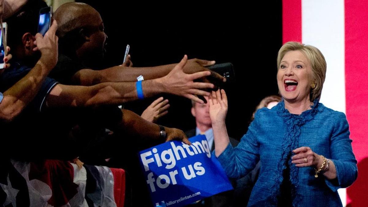 Democratic presidential candidate Hillary Clinton arrives to a cheering crowd in West Palm Beach, Fla., Tuesday night.