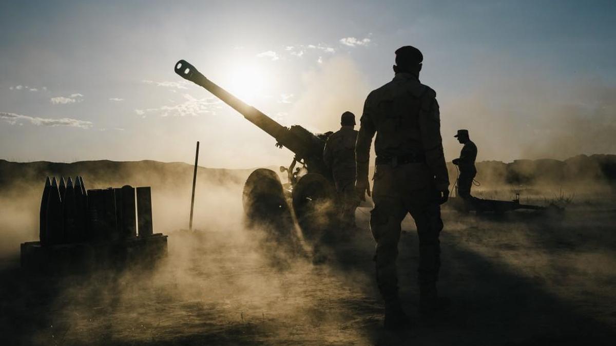 Iraqi soldiers fire artillery toward Islamic State positions from outside Makhmour, Iraq. U.S. troops are moving outside the confines of more established bases to give closer support to the Iraqi army as it prepares for an assault on the northern city of Mosul.