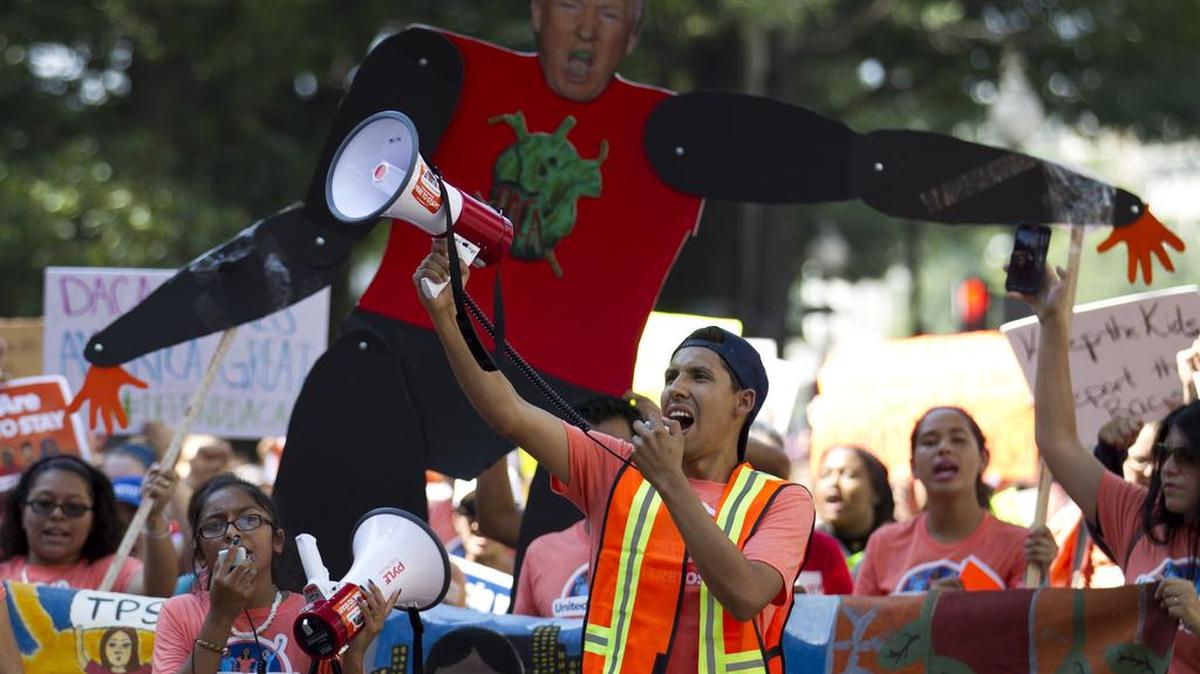 Protesters chants during a rally supporting Deferred Action for Childhood Arrivals, or DACA, outside of the White House in Washington, on Tuesday, Sept. 5, 2017. President Donald Trump's administration will "wind down" a program protecting hundreds of thousands of young immigrants who were brought into the country illegally as children, Attorney General Jeff Sessions declared Tuesday, calling the Obama administration's program "an unconstitutional exercise of authority." ( AP Photo/Jose Luis Magana)