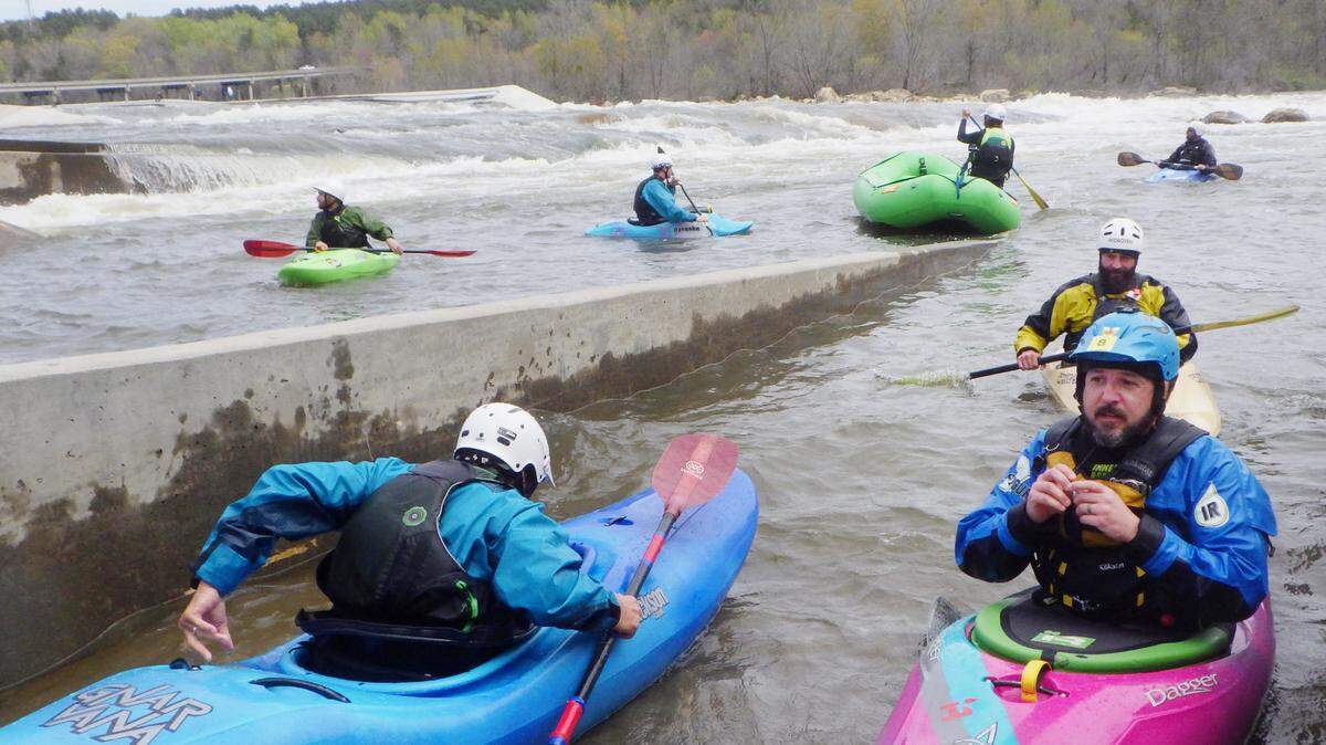 Kayakers paddle on the “paperclip” bypass on the Catawba River in Great Falls in March 2023, in this Herald file photo. Paddling areas that opened two years ago will be joined by a new state park covering hundreds of acres.
