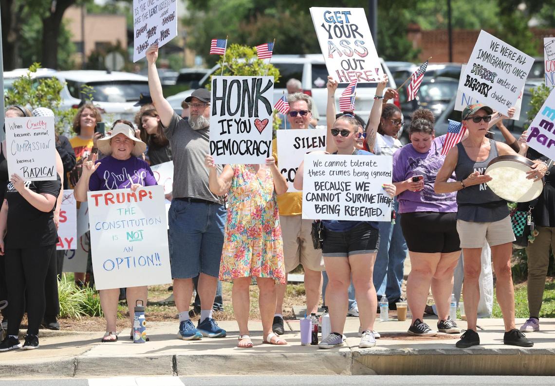 Hundreds of people gathered Saturday, June 14,, 2025 in downtown Rock Hill to protest the Trump administration.