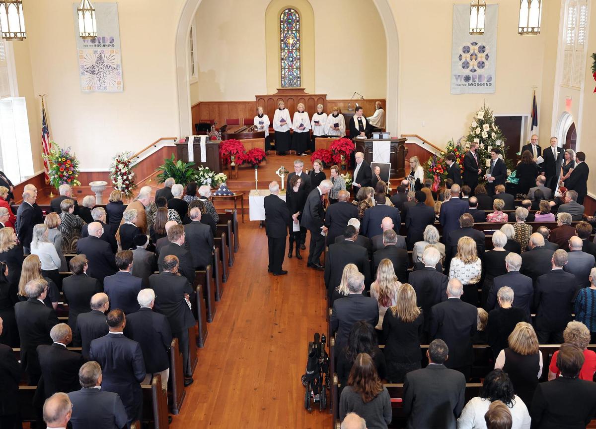 Family members of John Spratt, Jr. file into the sanctuary at First Presbyterian Church Wednesday for the longtime congressman’s funeral service.