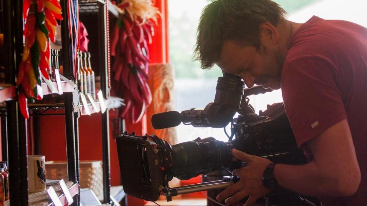 
Mark Jervis of Ireland films a scene at PuckerButt Pepper Company in Fort Mill on Saturday. 

