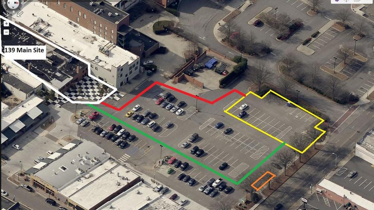 
Construction for the 139 Main apartment project is gearing up and preparations will affect the White Street parking lot in downtown Rock Hill. Yellow indicates location of staging area for construction activities. Orange indicates location of construction firm’s office trailer. White indicates location of 139 Main construction. Green indicates primary route to transport materials to construction site. Red indicates secondary route to transport materials to construction site
