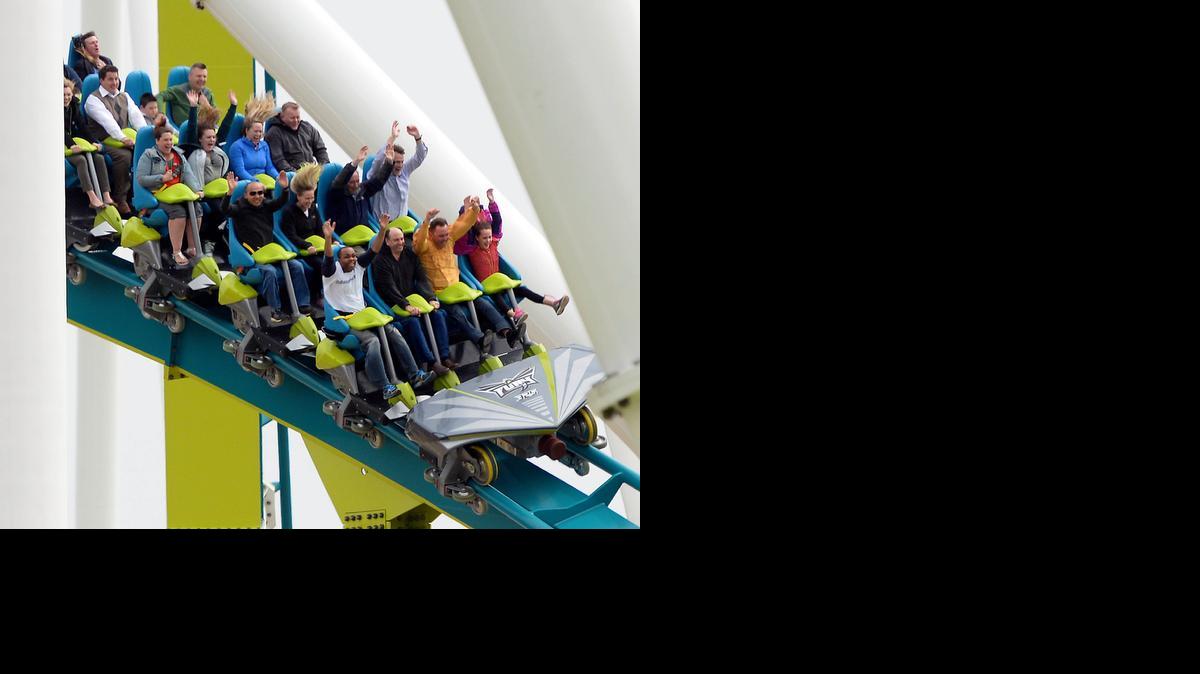 
Roller coaster riders enjoy their experience on Carowinds' new Fury 325, the world tallest and fastest giga coaster, during media day on Wednesday.
