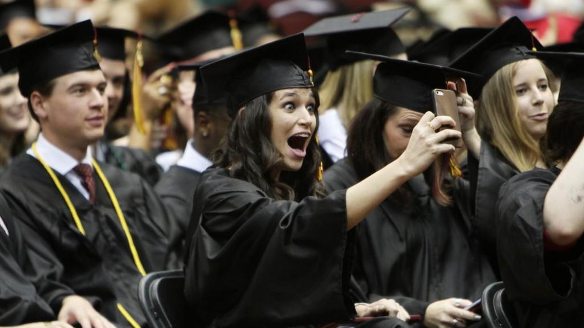 Ashley Scarborough takes a selfie during Winthrop University graduation Saturday. Nearly 700 degrees were conferred to undergraduates.