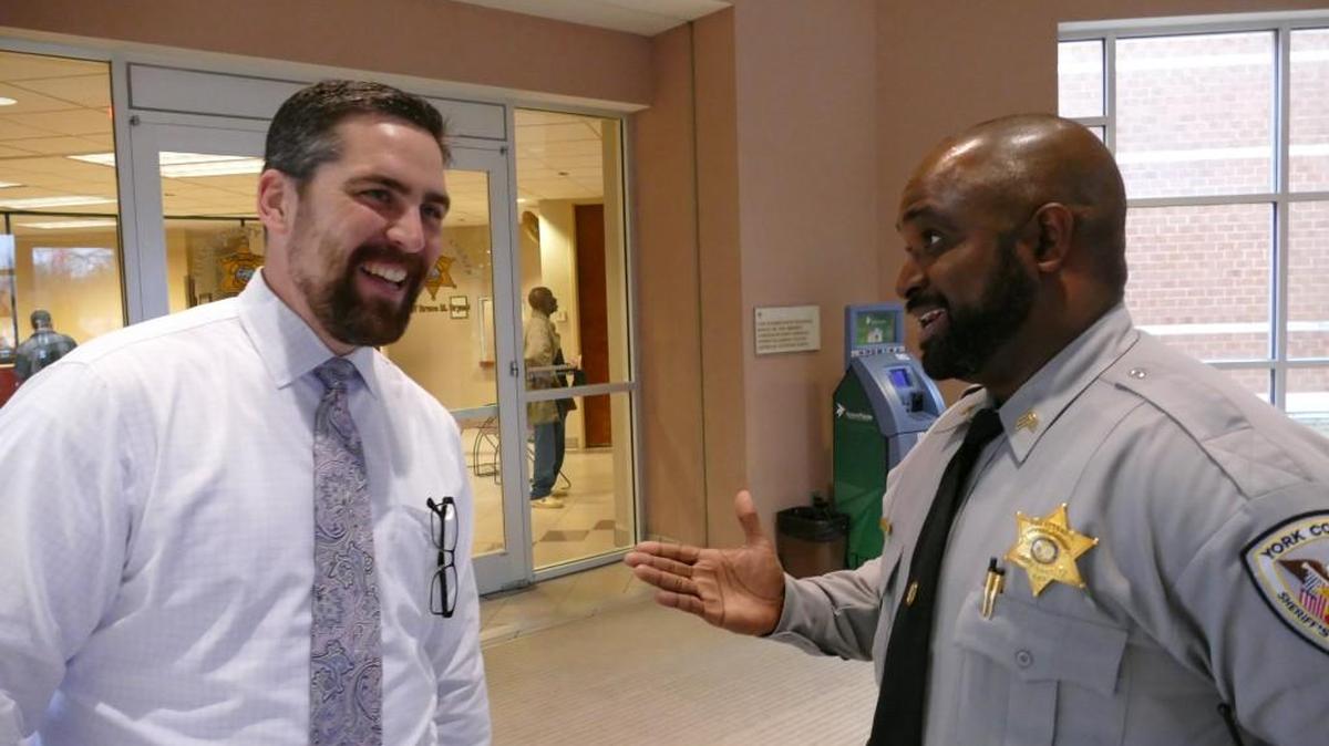 York County Sheriff’s Office public information officer Trent Faris, left, and Sgt. Melvin Billingslea compare their beards Monday, which was the end of No-Shave November. Sheriff’s office employees raised more than $2,600 for the American Cancer Society by paying $20 each to bypass the agency’s policy on facial hair grooming.