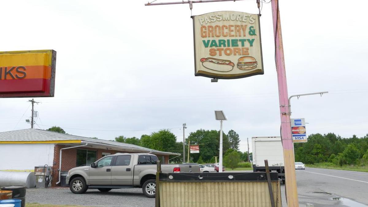 
The sign outside Passmore’s Grocery on Saluda Road, where the country store has stood since 1935. Zora Passmore Black ran the family business for more than 50 years until she passed away last week.

