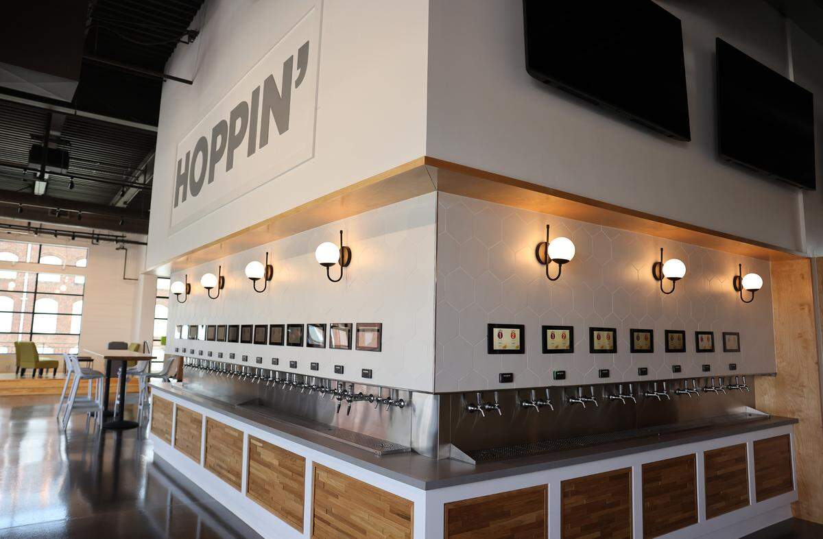 Hoppin’ Rock Hill is a self-pour taphouse with beer garden, located in an historic cotton warehouse in downtown Rock Hill.