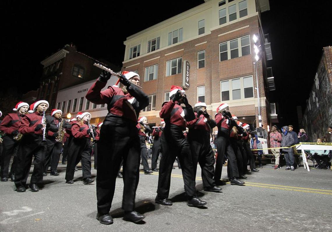 The Rock Hill High School marching band performs at the Rock Hill Christmas parade on Main Street in this file photo. Rock Hill will perform its show “Now You See Me” this fall.