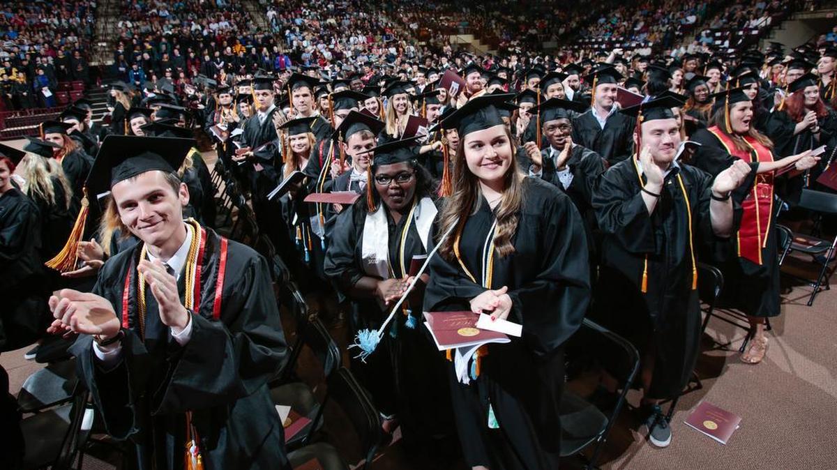 Students applaud their parents during Saturday’s commencement ceremonies at Winthrop University.